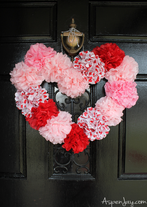 Tissue paper heart wreath tutorial. Inexpensive and pretty heart craft to make for Valentines. Super cute! 